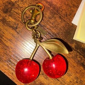 Coach cherries charm
